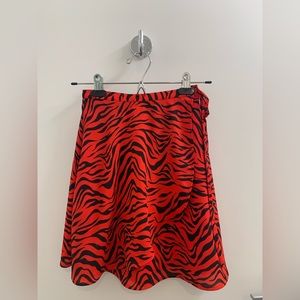 ARITZIA Sunday Best Red Zebra Print Wrap Around Mini Skirt in 00